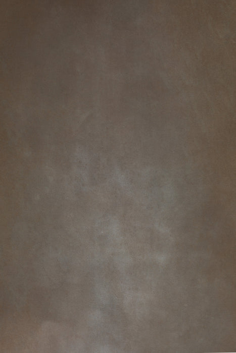 Warm brown backdrop with gray clay vignette