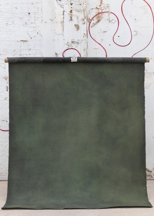 Conifer green hand painted backdrop hung outdoors