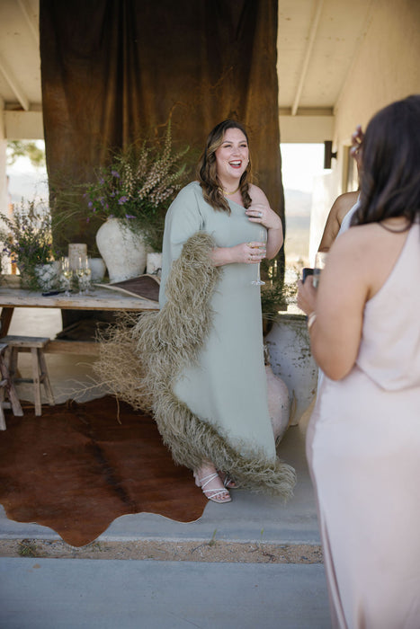 hand painted backdrop behind designer Nicole Chapman design. Photographed by Anya Kernes