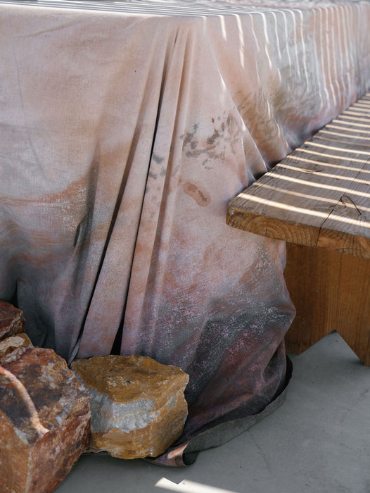 Hand painted and textured backdrop as tablecloth with Utah stones. Photo by Anya Kernes