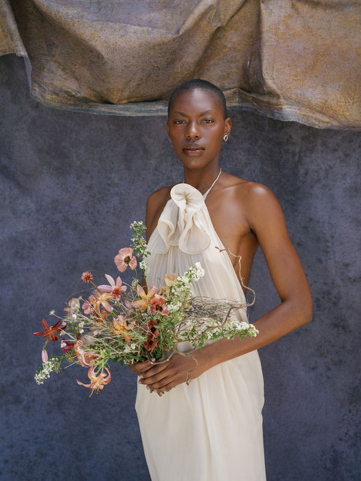 bride portrait with hand painted art installation. Image by Anya Kernes.