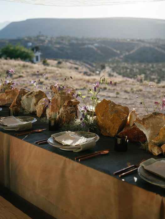 clematis and stone on a luxury tablescape at Joshua Tree.