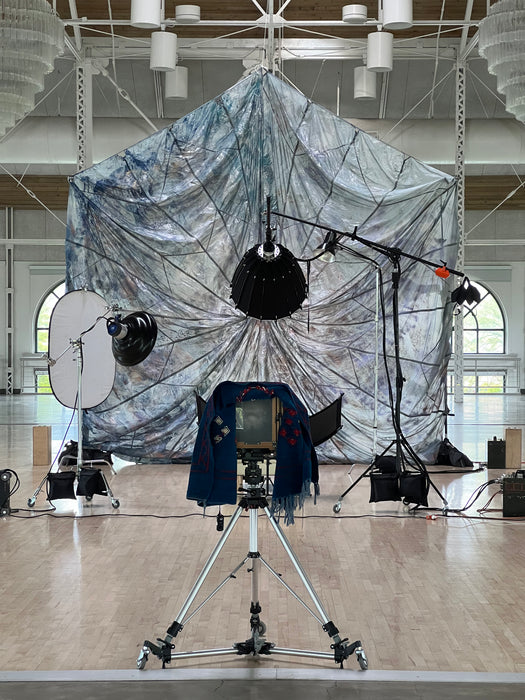 hand painted parachute installed in ballroom with tin type camera at Kilby Block Party
