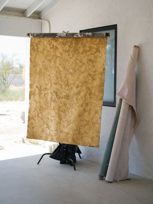 Gold foiled custom backdrop hung on c-stand. Image by Anya Kernes for the Nicole Chapman Design Retreat in Joshua Tree.