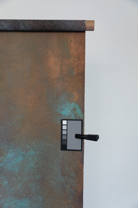 production backdrop in orange, copper and blue with color and gray card