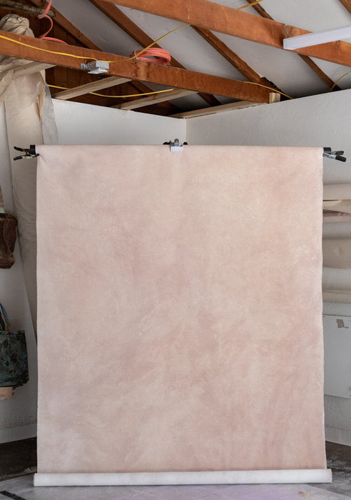 light pink hanging photo backdrop