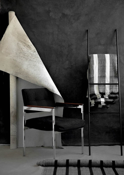 Black hand painted canvas wall covering styling prop for textiles. Image by Steph Kirk