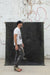 Matthew Peterson walks in front of medium 6x8 backdrop