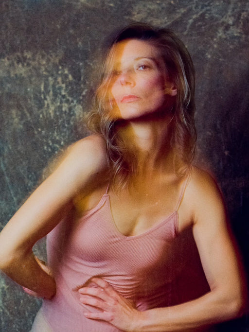 portrait of woman with hand painted backdrop