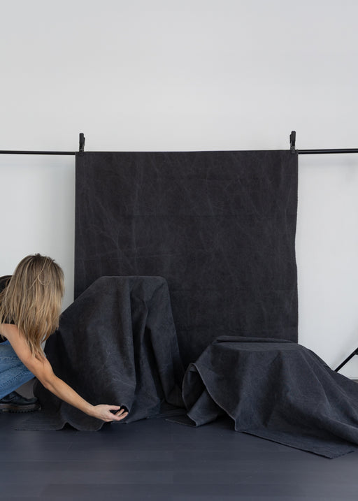 stylist covers stool in photo studio