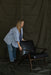 stylist sets leather chair on giant rentable parachute backdrop