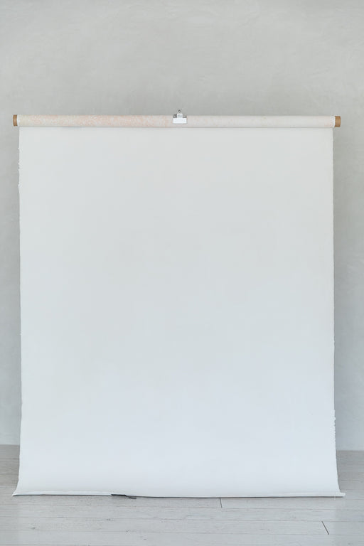 white hand painted canvas on vice clamp in photo studio