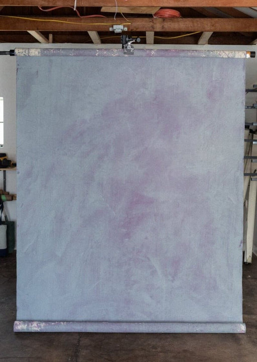 ethereal light textured light blue purple marbled background
